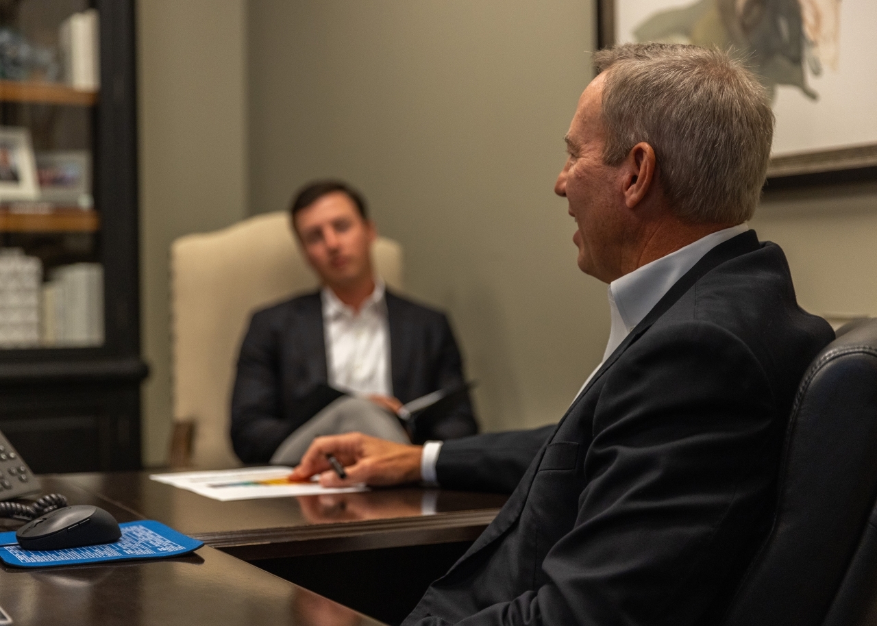 Sonny and Luke Skinner talking in Sonny's office